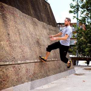 Jason W. Bay practices parkour wall runs